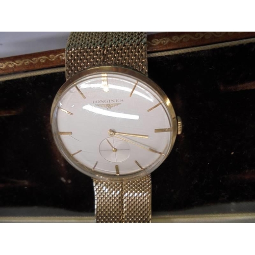 1074 - A vintage cased Longines 9ct gold wrist watch.