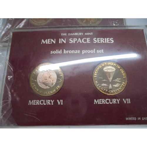 1102 - The D Day 75th Landing Anniversar set and four 'Men in Space' bronze coin sets.