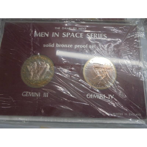 1102 - The D Day 75th Landing Anniversar set and four 'Men in Space' bronze coin sets.