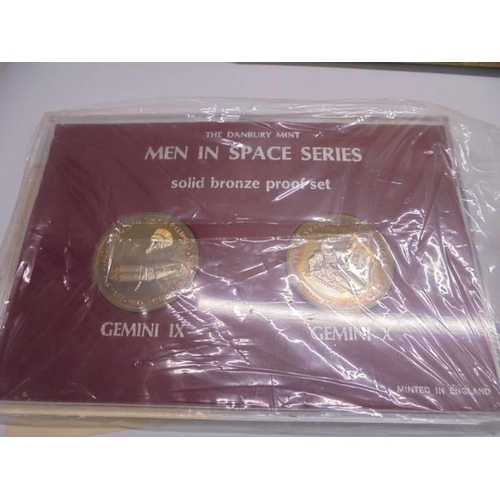 1102 - The D Day 75th Landing Anniversar set and four 'Men in Space' bronze coin sets.