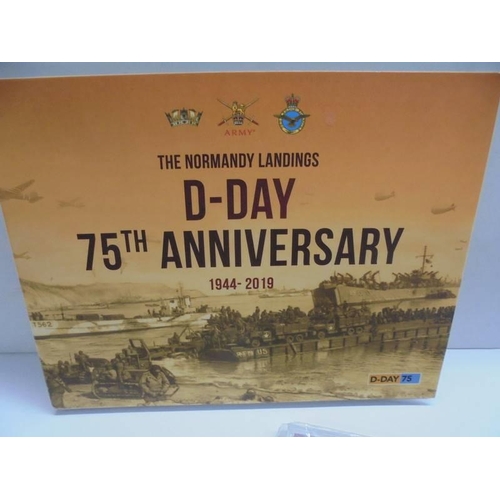 1102 - The D Day 75th Landing Anniversar set and four 'Men in Space' bronze coin sets.