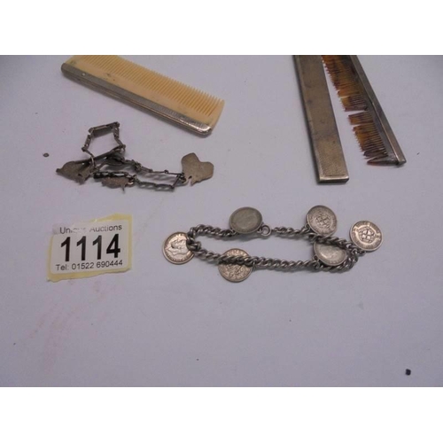 1114 - Two silver cased comb, another comb and two charm bracelets.