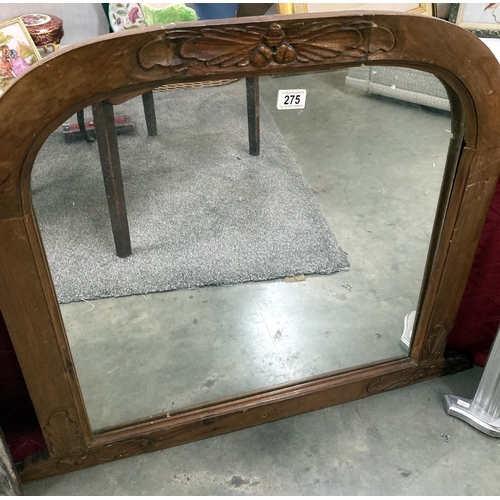 275 - A vintage arched over mantle mirror 92 x 76cm