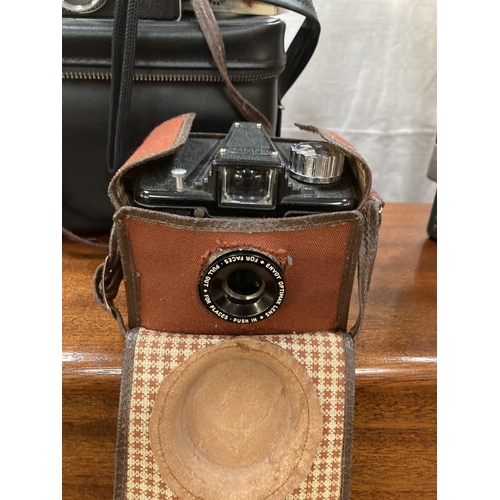 284 - 3 Vintage cameras with cases. Rex, Kodak, Ilford