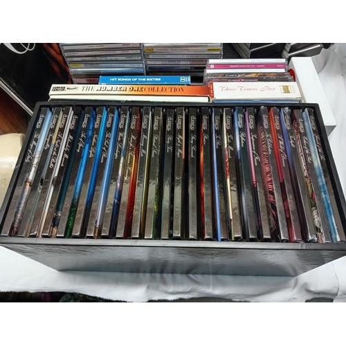 316 - A quantity of CDs, LPs & The history of rock cassettes