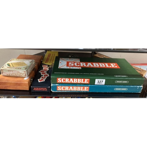 327 - 2 Scrabble games, 1 unopened inside, A Scrabble turntable, Compendium & Solitaire