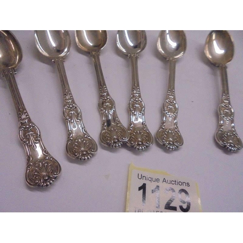 1129 - A set of six silver Kings pattern tea spoons approximately eight ounces.