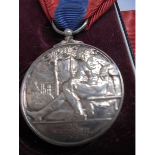 1136 - An Elizabeth II 'For Faithful Service' medal for Inspector's Post Office Kingston on Thames.