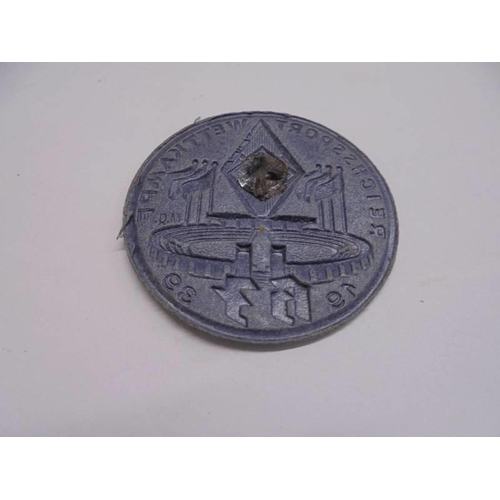 1142 - A 1939 Reichssport Wettkampf badge, a 1 Mai 1937 German workers badge and three WW2 German coins 194... 