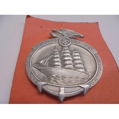 1143 - A WW2 German Navigation badge by Paul Schulze & Co., Lubeck.