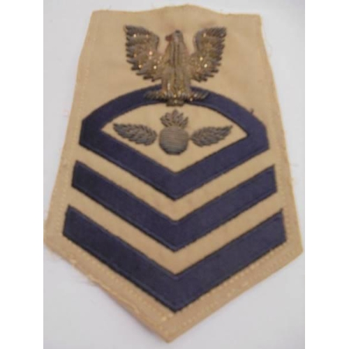 1150 - A set of military ribbons and a US Navy Boatswain's mate Chief Petty Officer bullion rate patch.