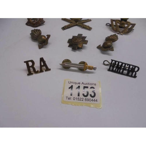 1153 - A quantity of military cap badges including Royal Army Medical Corps.