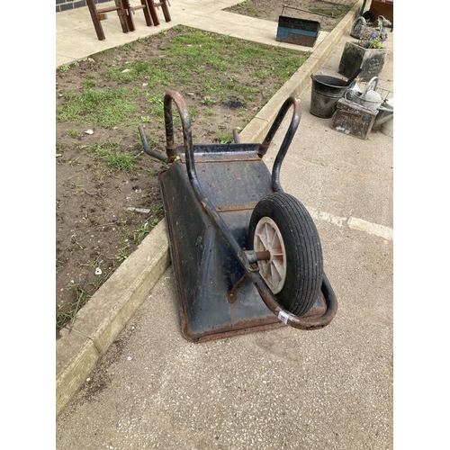 208 - A metal wheel barrow