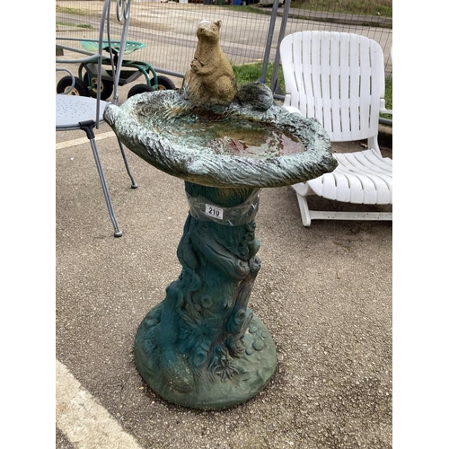 210 - A heavy bird bath with squirrel