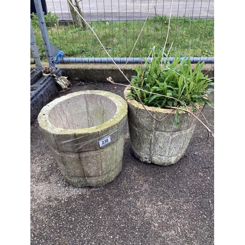 236 - A pair of round concrete planters