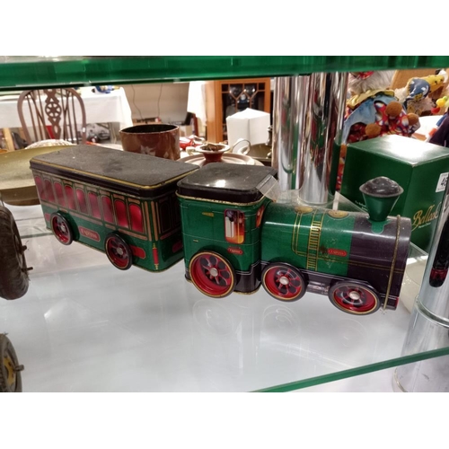 460 - A quantity of tinplate toys including Mettoy tractor & trailer, Silver mountain battery operated tra... 