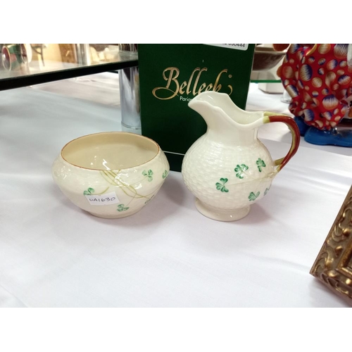 462 - A boxed Belleek milk jug & An unboxed Belleek sugar bowl