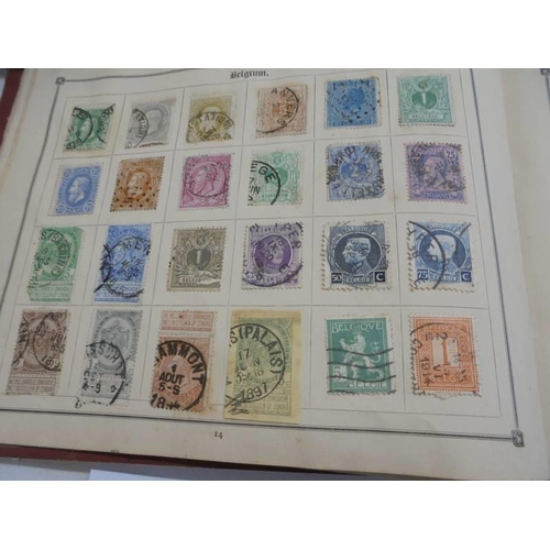 1172 - An early stamp album including penny black, 2d blue, Victorian, European, Commonwealth and a folder ... 