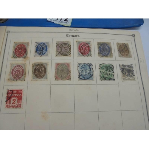 1172 - An early stamp album including penny black, 2d blue, Victorian, European, Commonwealth and a folder ... 