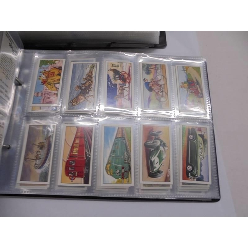 1175 - Two albums of sets of cigarette cards.