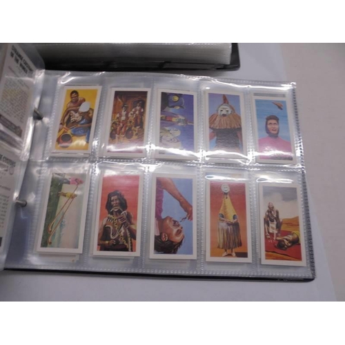 1175 - Two albums of sets of cigarette cards.