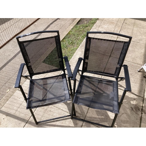 163 - A pair of black folding garden chairs