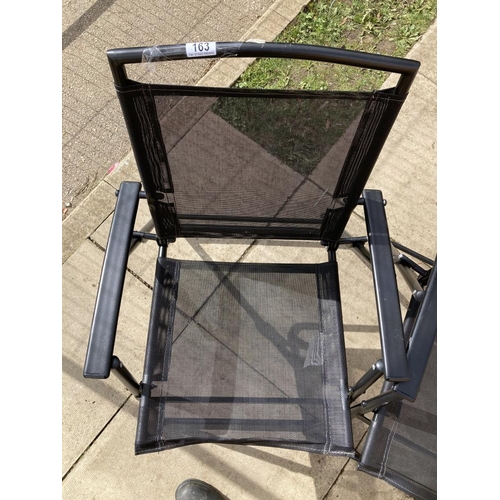 163 - A pair of black folding garden chairs