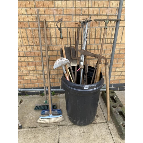 174 - A quantity of garden tools & 3 brooms