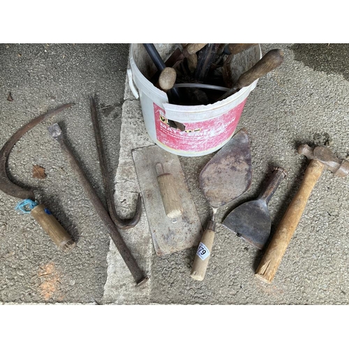 179 - A bucket including cement, plaster floats & other tools