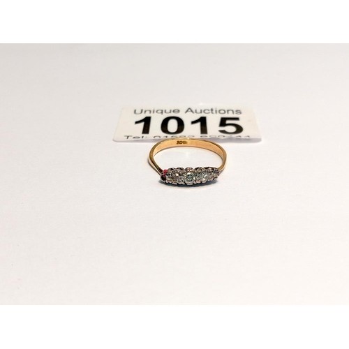 1015 - An 18ct gold diamond ring, size K, 2.4 grams.