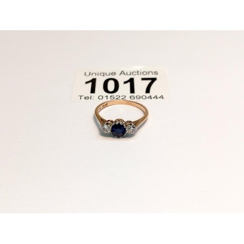 1017 - An 18ct gold diamond and sapphire ring, size K half,  2.4 grams.