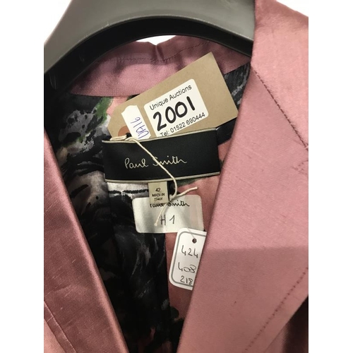 2001 - Paul Smith New. Long Jacket Dusky Pink
Black Rose Detail lining
Three buttons on cuff.
Paul Smith Ne... 