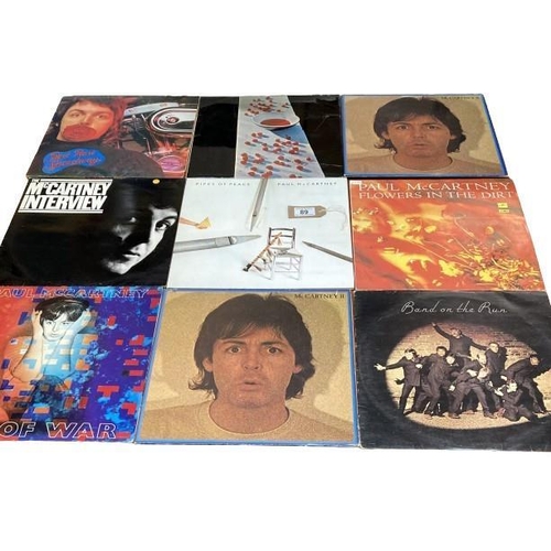 89 - 15 Fab Four solo albums. Vinyl mixed con, Covers used.