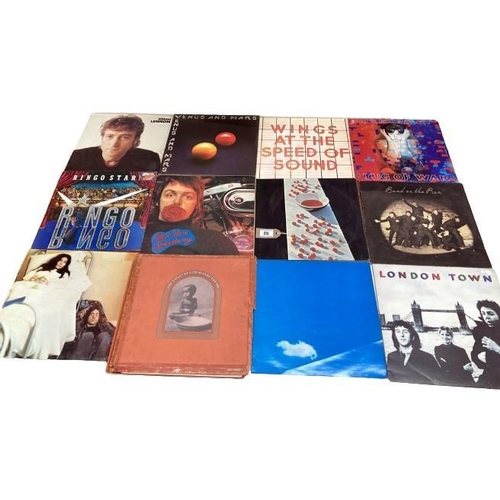 89 - 15 Fab Four solo albums. Vinyl mixed con, Covers used.