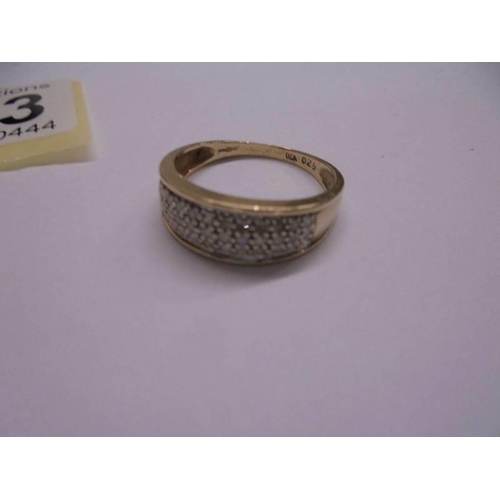 1083 - A diamond band ring quarter carat diamond weight, hall marked 9ct gold shank, size O.