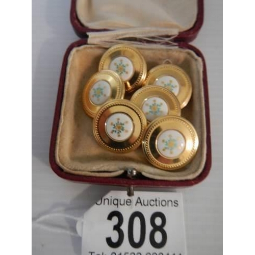 308 - A set of six 20th century dress buttons.