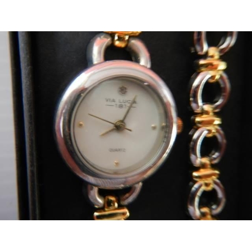 313 - A ladies wrist watch and a gent's wrist watch.