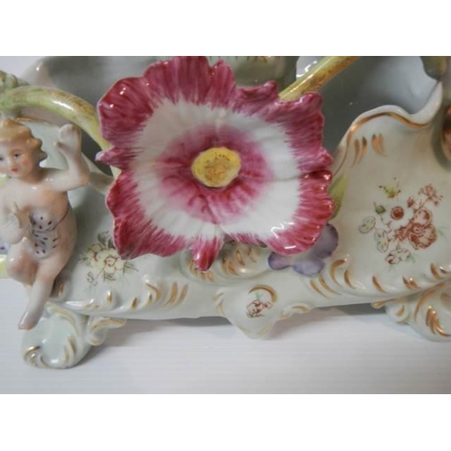 320 - A good quality 20th century porcelain French style table centrepiece.