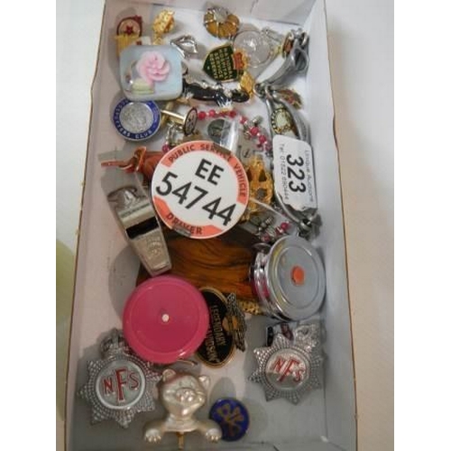 323 - A mixed lot of badges, whistles, brooches etc., (approximately 40 pieces)