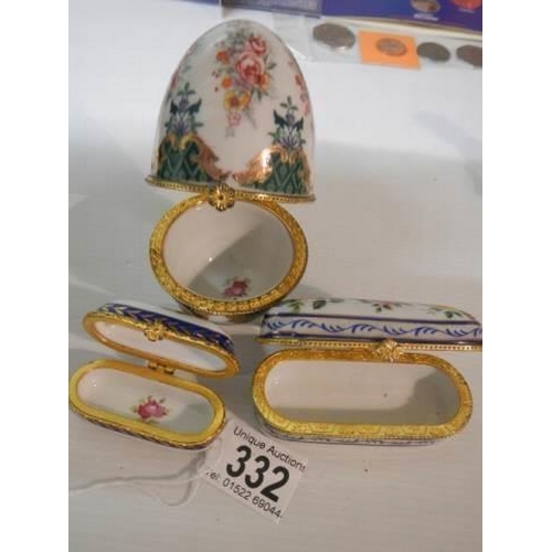 332 - Two porcelain patch boxes and an egg shaped trinket box.