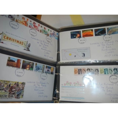 340 - An album of approximately eighty first day covers.