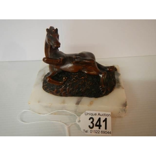 341 - A good quality horse on a marble base paperweight.