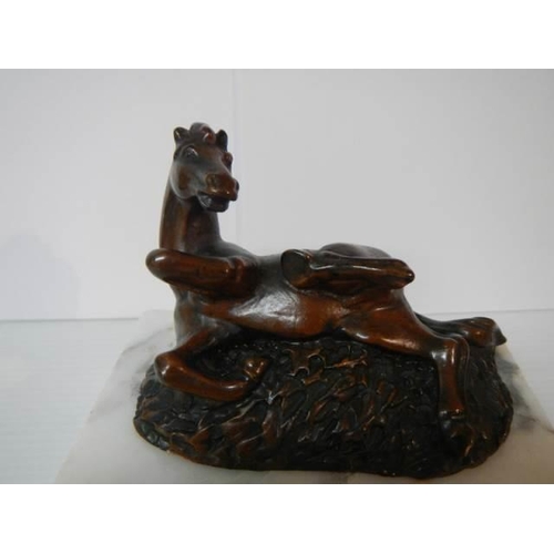 341 - A good quality horse on a marble base paperweight.