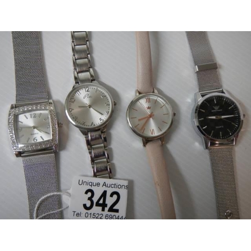 342 - Four good gent's wrist watches.