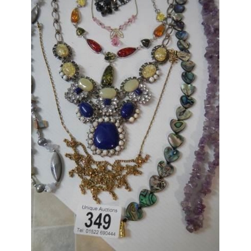 349 - Eight good quality necklaces.