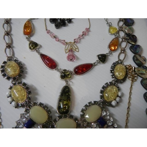 349 - Eight good quality necklaces.