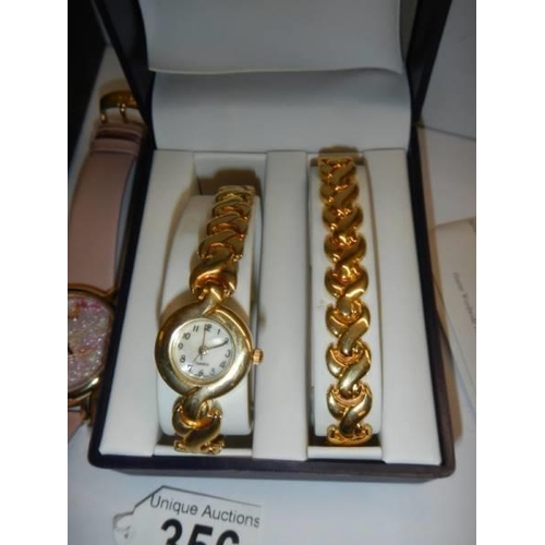 356 - Four good boxed wrist watches.