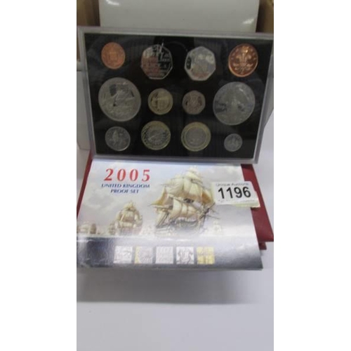 1196 - Six boxed de-luxe proof coin sets in cases and with booklets etc.,