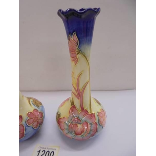 1200 - A pair of Old Tupton Ware hand painted vases, 20 cm tall.