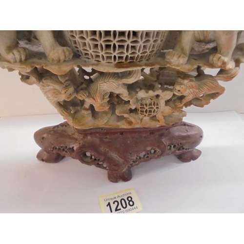 1208 - A large soapstone incense burner featuring lions.